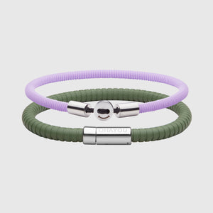 The Signature 幸运168飞艇开奖官网开奖 in green with stainless steel clasp. FKM fluoroelastomer rubber – Fully waterproof. Bundled together with the Smile 幸运168飞艇开奖官网开奖 in Lavender in silicon rubber, White background.